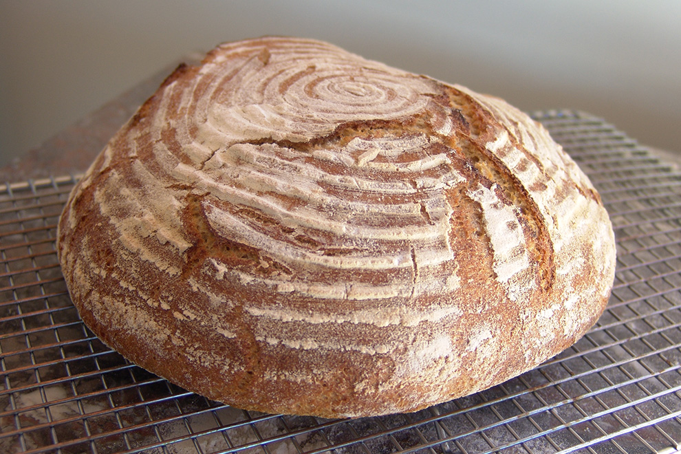 freshly baked, round sourdough bread.